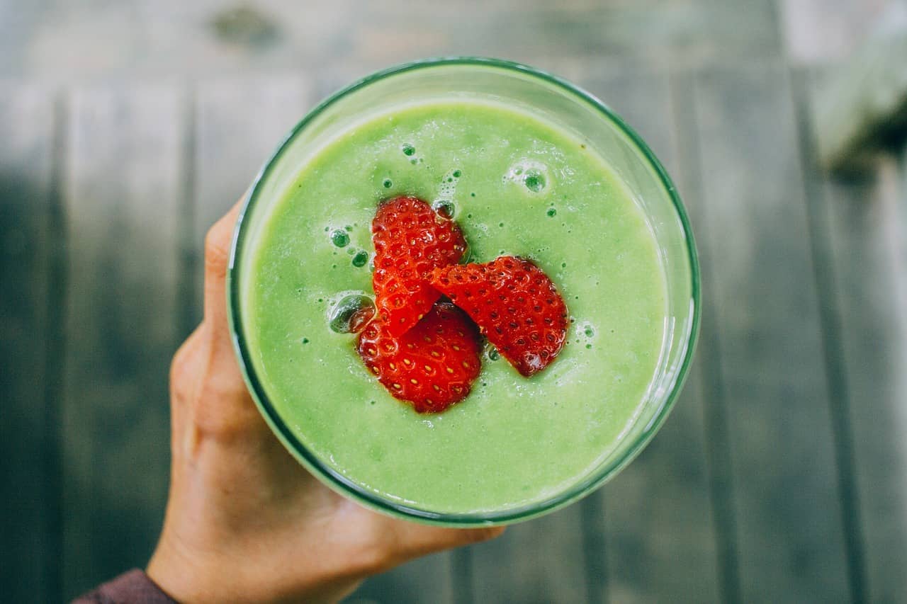 Five colorful breakfast smoothies made with fresh fruits, vegetables, and seeds, representing 5 healthy smoothie recipes for a nutritious morning.