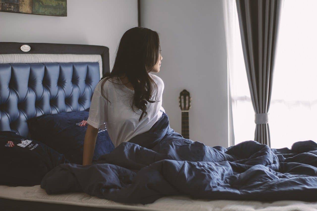 Person practicing a bedtime routine – how to get a good night sleep